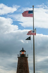 American Flags Over Point Judith Light Tower in Rhode Island